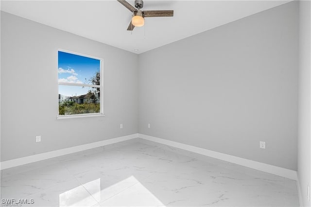 unfurnished room with ceiling fan