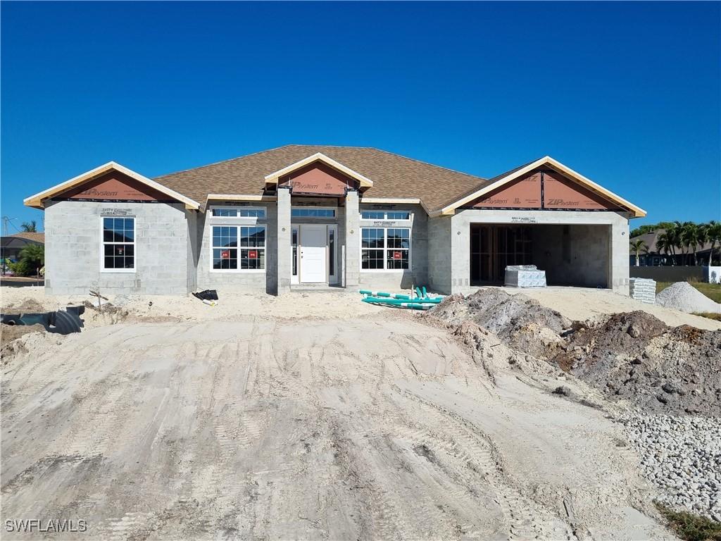 property in mid-construction featuring a garage