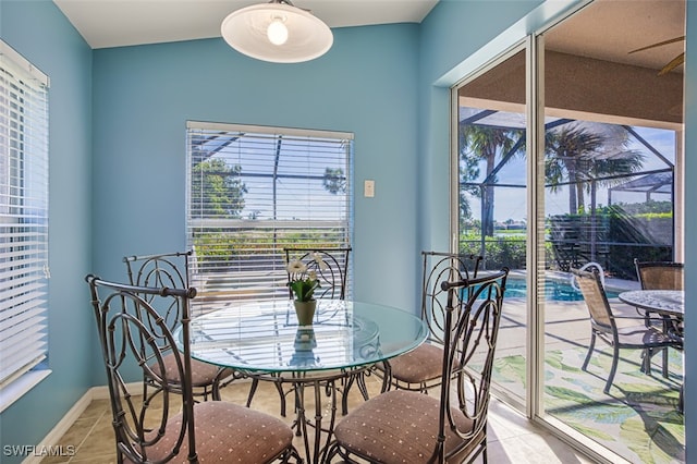 tiled dining area with plenty of natural light