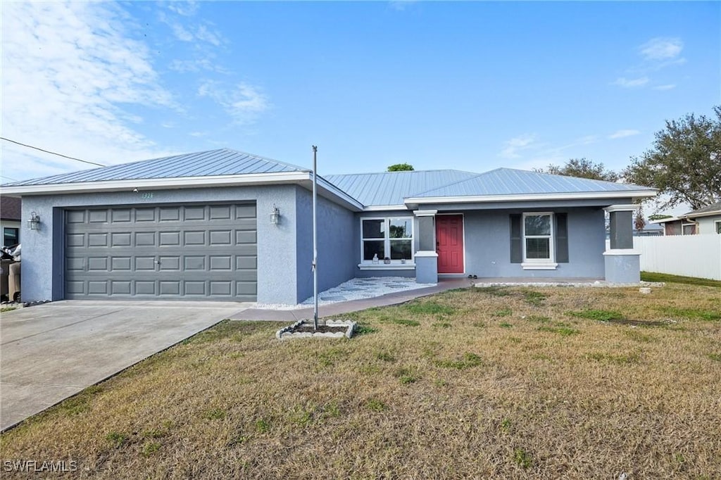 ranch-style house with a front yard and a garage