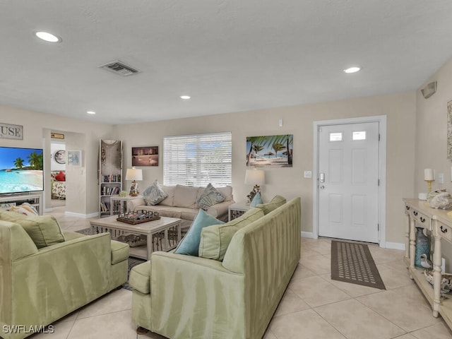 living room featuring light tile patterned flooring