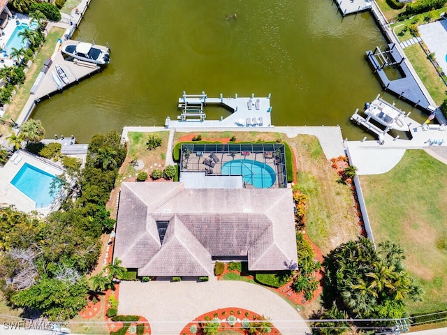 birds eye view of property featuring a water view