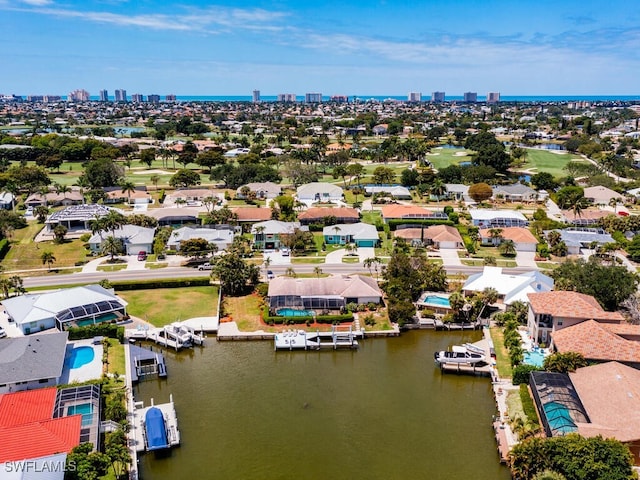 bird's eye view with a water view