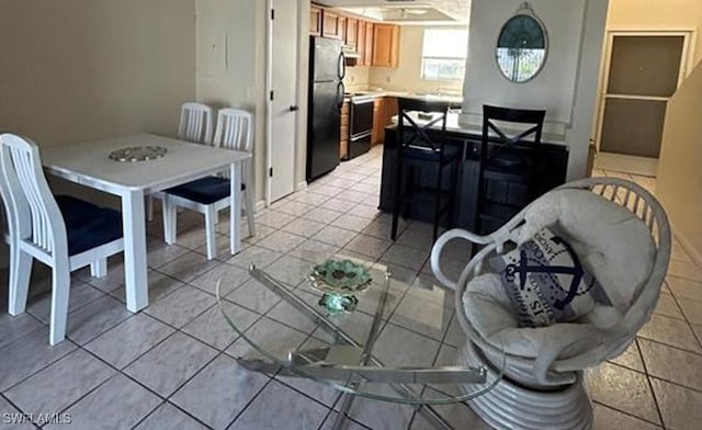 dining room with light tile patterned floors