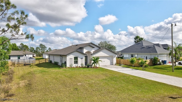 view of front facade featuring a front lawn and a garage