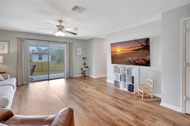 unfurnished living room featuring light hardwood / wood-style floors and ceiling fan