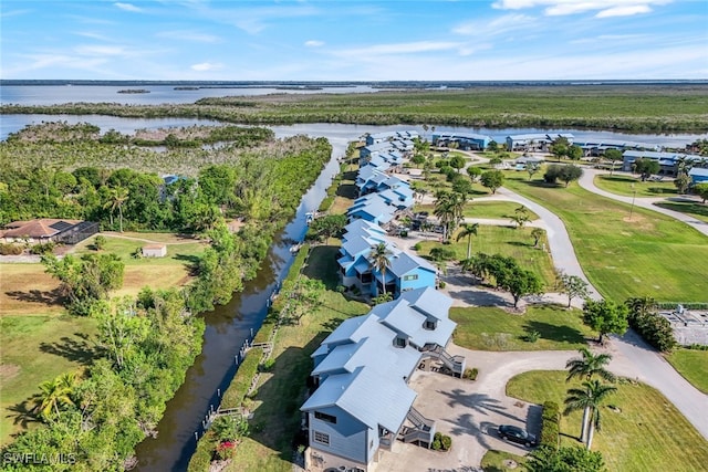 drone / aerial view featuring a water view