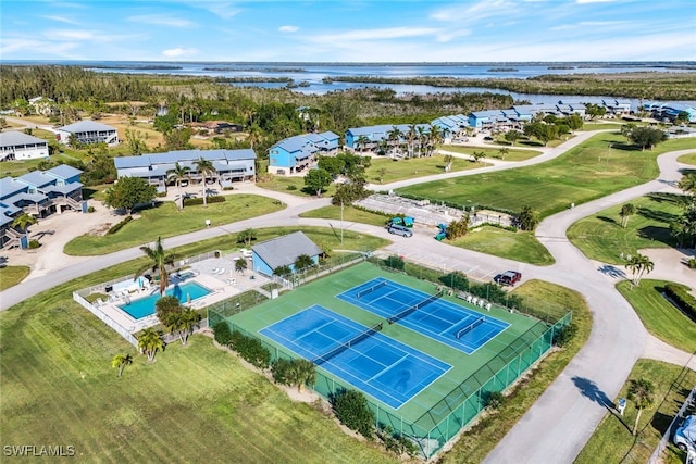 bird's eye view with a water view