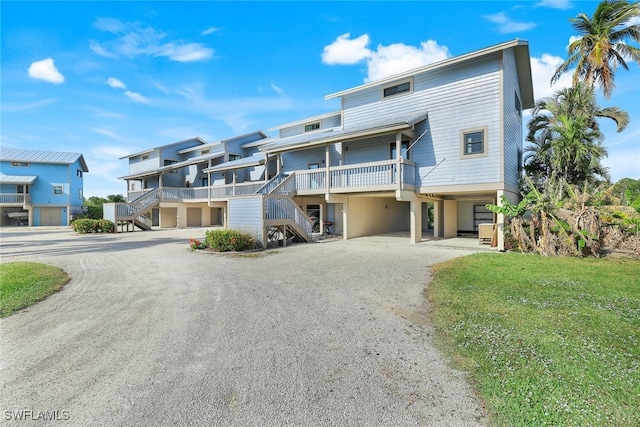 view of front of home with a carport