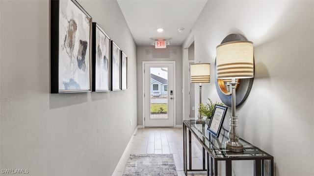 entryway featuring baseboards