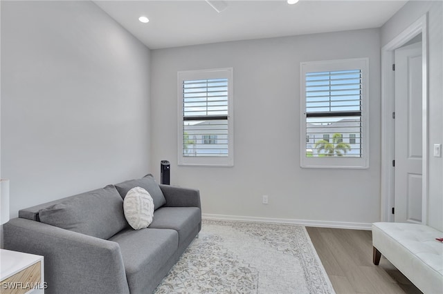 sitting room with light hardwood / wood-style flooring