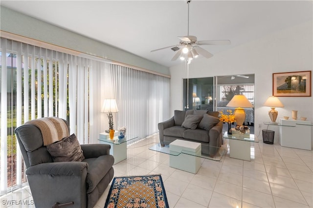 living room featuring ceiling fan and light tile patterned floors