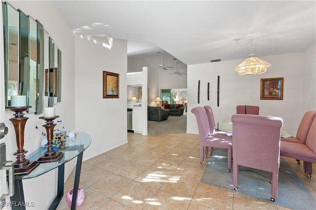 dining room featuring ceiling fan and light tile patterned floors