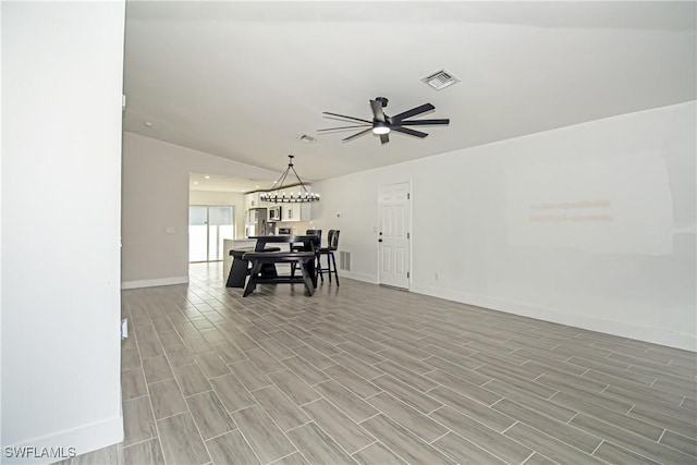 unfurnished dining area featuring ceiling fan and light hardwood / wood-style floors