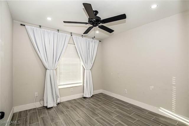 unfurnished room with ceiling fan