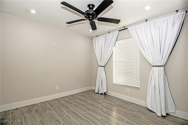 unfurnished room with ceiling fan