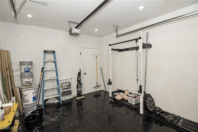 exercise room with brick wall