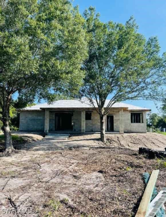430 Bald Cypress Ave, Clewiston, FL 33440 - view of front of house with a garage