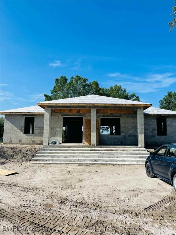 430 Bald Cypress Ave, Clewiston, FL 33440 - view of front of property featuring concrete block siding and covered porch
