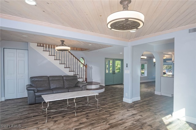 living room featuring dark hardwood / wood-style floors, wooden ceiling, and french doors