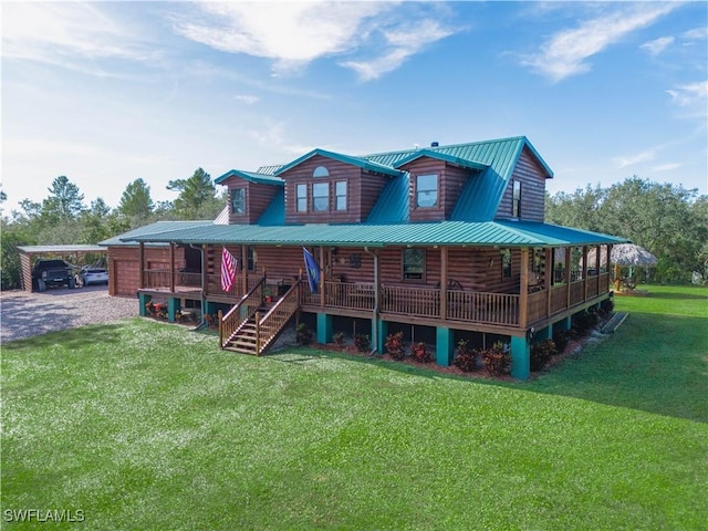 rear view of property featuring a yard, covered porch, and a carport