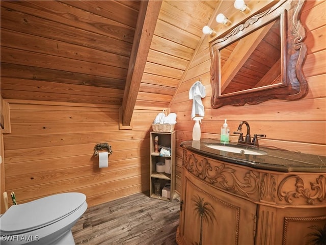 bathroom featuring vanity, wooden ceiling, wooden walls, toilet, and wood-type flooring