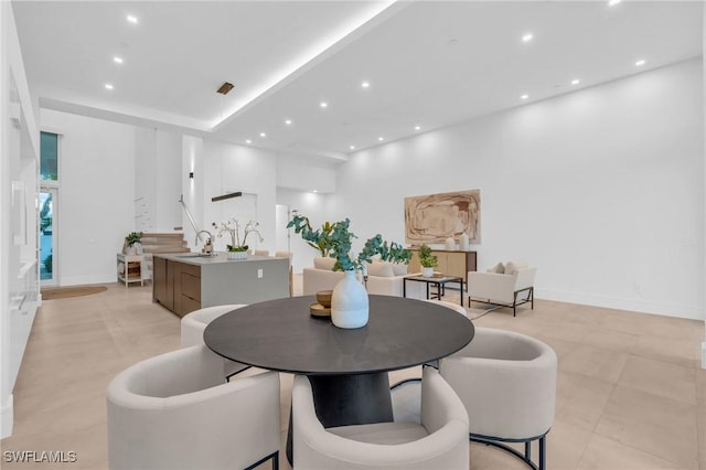 dining space featuring sink