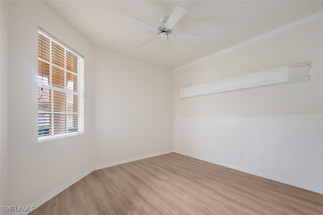 unfurnished room featuring light hardwood / wood-style flooring and ceiling fan