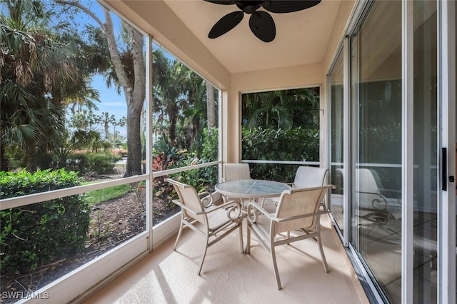 sunroom / solarium with ceiling fan