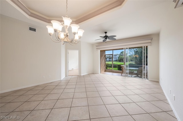 unfurnished room featuring light tile patterned floors, ceiling fan with notable chandelier, and a tray ceiling