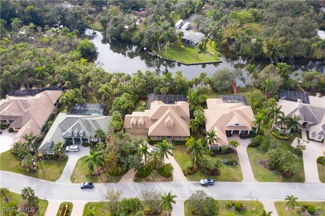 birds eye view of property featuring a water view