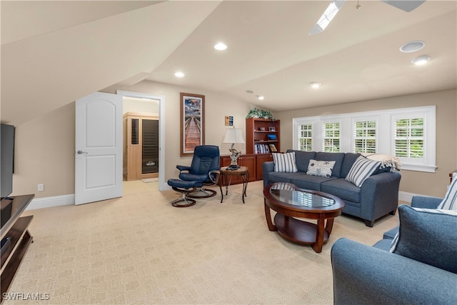 living room with light carpet and vaulted ceiling