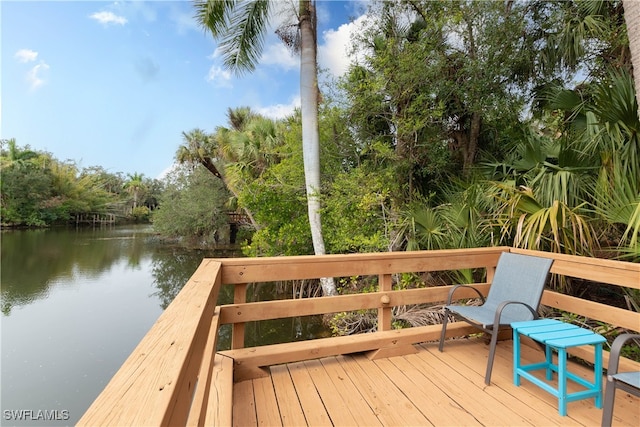 deck featuring a water view