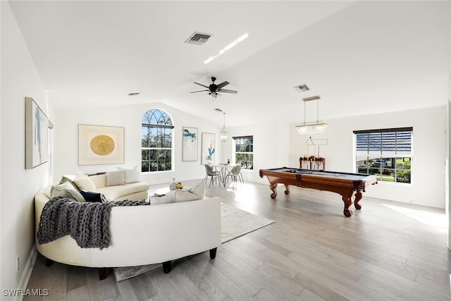 game room with light hardwood / wood-style floors, vaulted ceiling, ceiling fan, and billiards