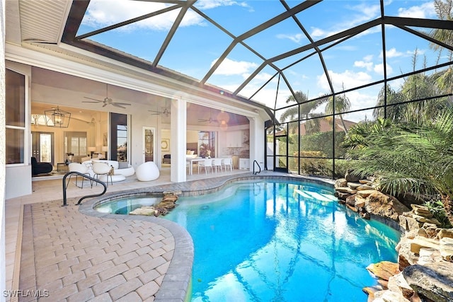 view of swimming pool featuring a patio, an outdoor hangout area, ceiling fan, and a lanai