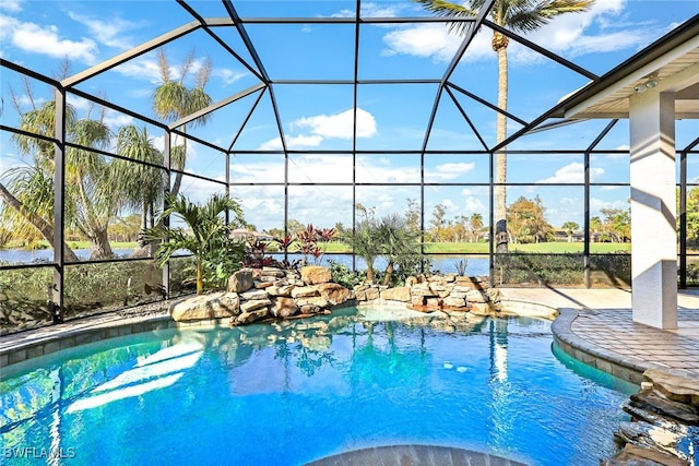 view of swimming pool with glass enclosure