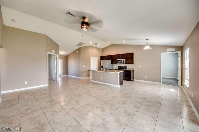 kitchen with lofted ceiling, hanging light fixtures, ceiling fan, light tile patterned floors, and stainless steel appliances