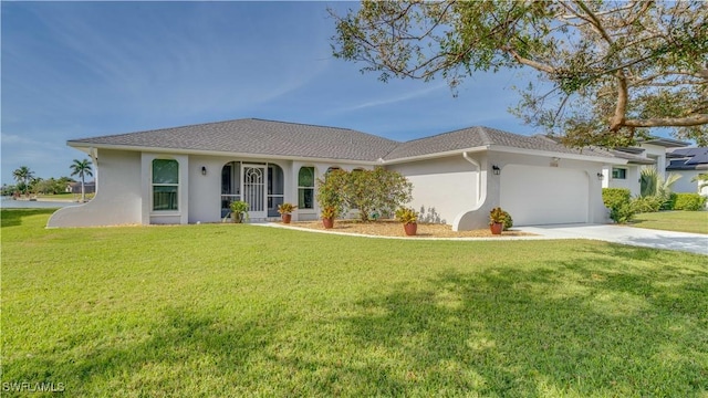 view of front facade featuring a garage and a front yard