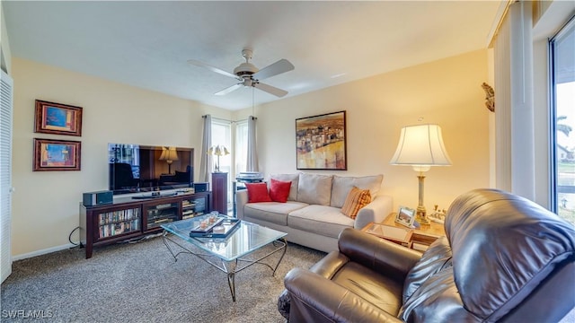 living room with carpet floors and ceiling fan