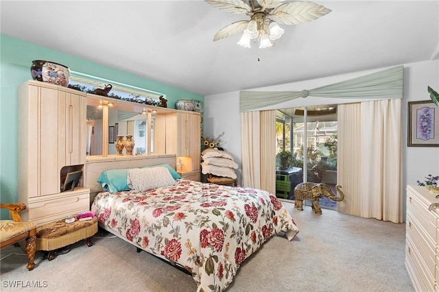 carpeted bedroom with access to exterior and ceiling fan