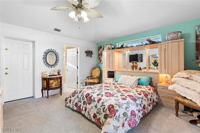 bedroom featuring ceiling fan and light colored carpet