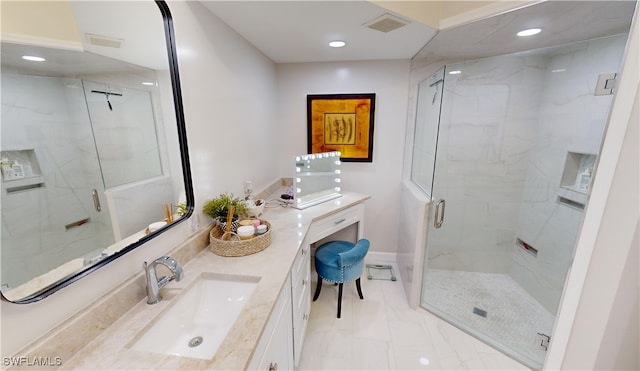 bathroom featuring vanity and walk in shower