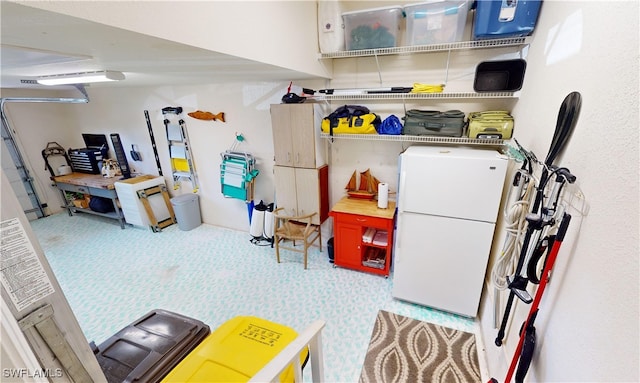 interior space featuring carpet floors and white fridge