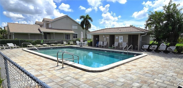 view of pool featuring a patio area