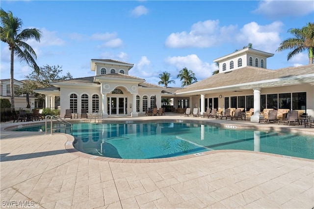 view of swimming pool featuring a patio area