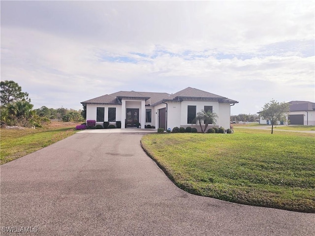 view of front of home with a front lawn