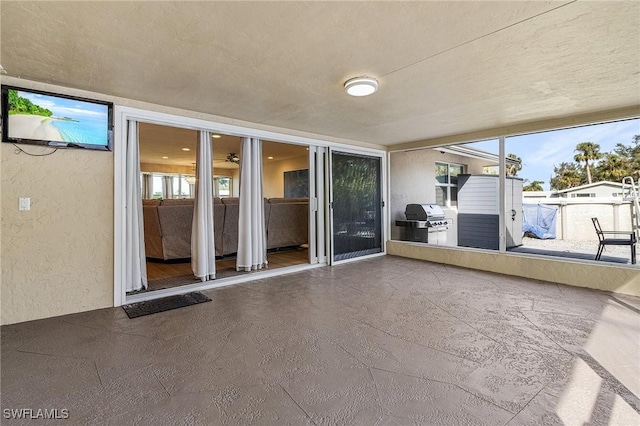 unfurnished sunroom with plenty of natural light