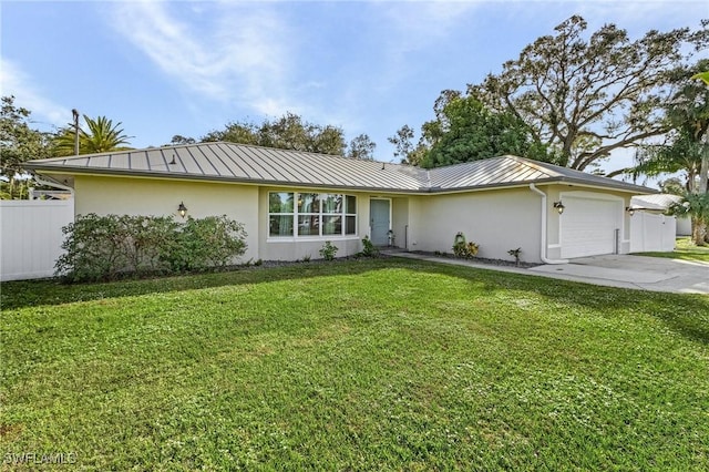 ranch-style house featuring a garage and a front yard