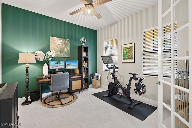 workout area with carpet flooring and ceiling fan