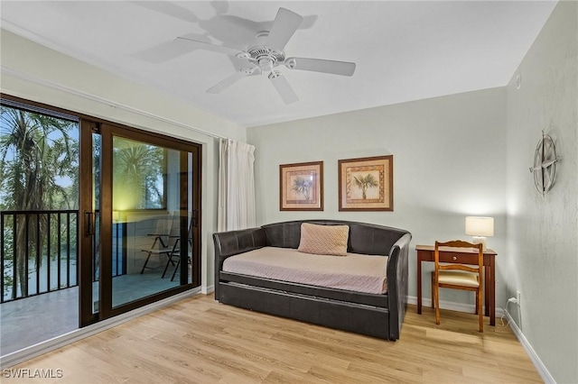 sitting room with light hardwood / wood-style flooring and ceiling fan